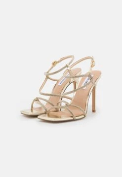 Steve Madden Implicit - Sandalen Met Hoge Hak - Gold 8 Steve Madden Implicit - Sandalen Met Hoge Hak - Gold -SchoenenPlezier bf3ca453b0184f97aae795f92b034ca0 scaled